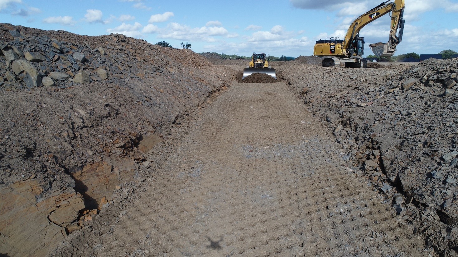 Excavators completing work on Lostock Lane, the Bellway Homes site undergoing earthworks by BSH Remediation.